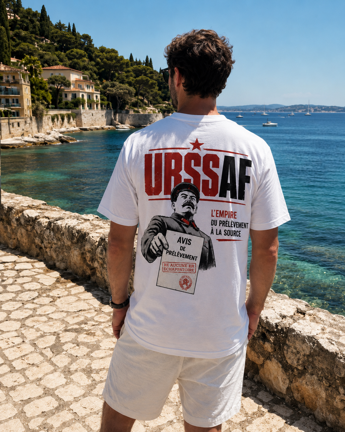 T-shirt L'Empire du Prélèvement porté de dos sur la Côte d'Azur